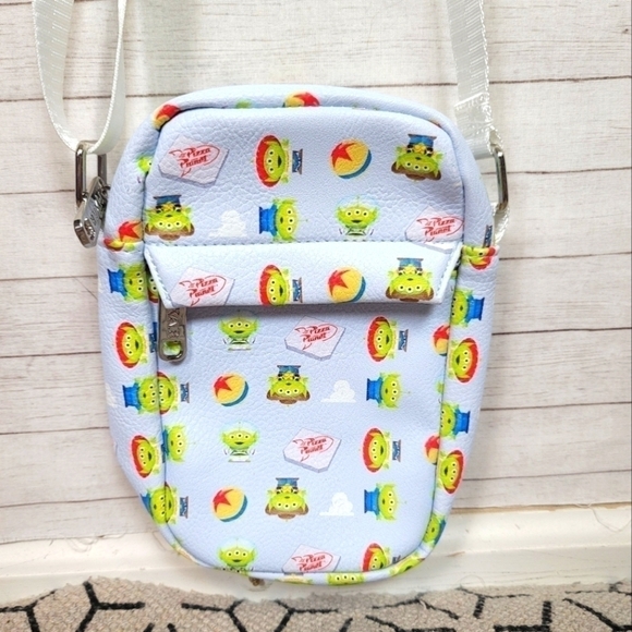 TOY STORY ALIEN PIXAR CROSSBODY BAG FROM BUCKLE-DOWN - Picture 1 of 12